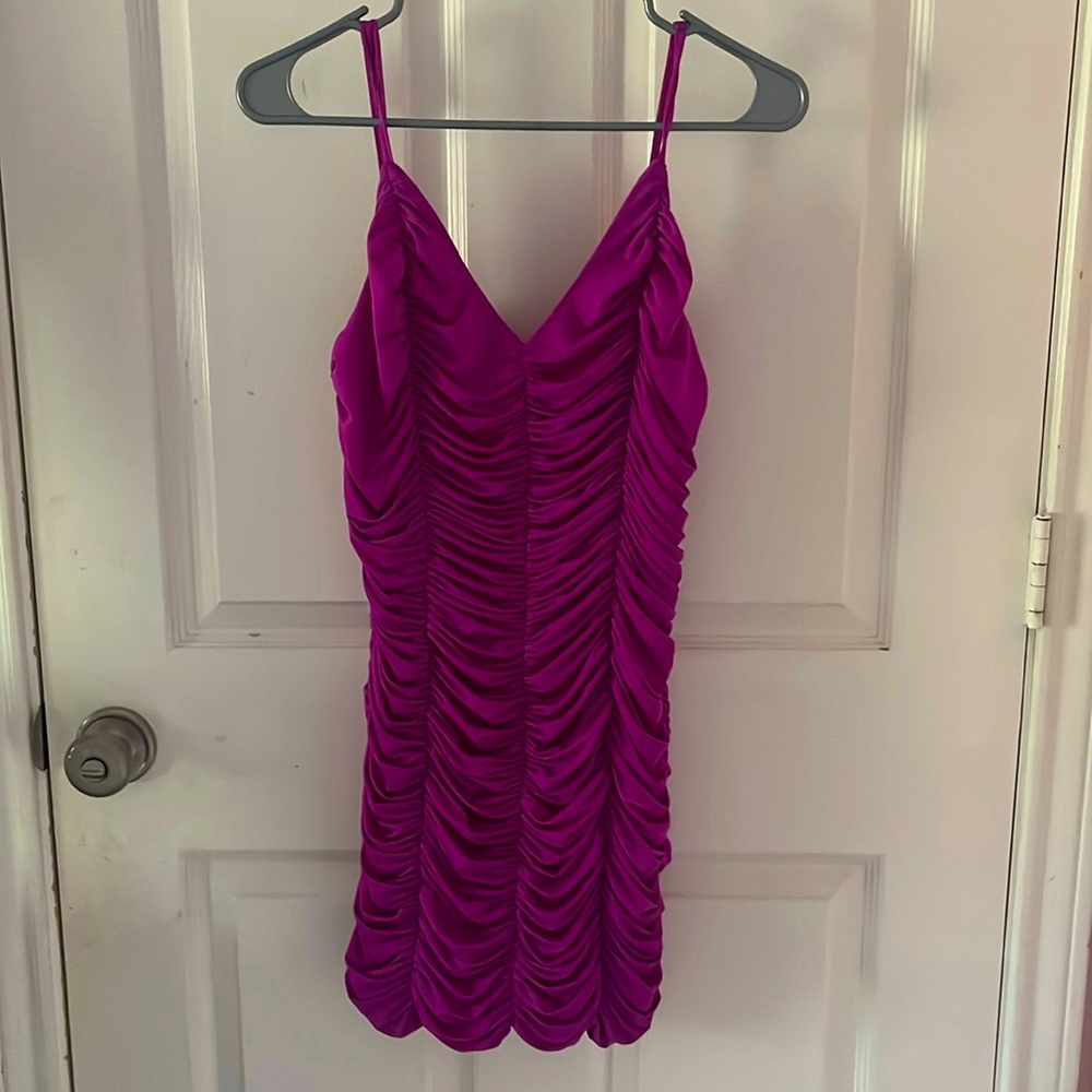 A magenta party dress. Made by DO+BE. Brand new only worn once.